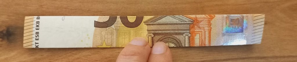 Zusammengeklappter Geldschein